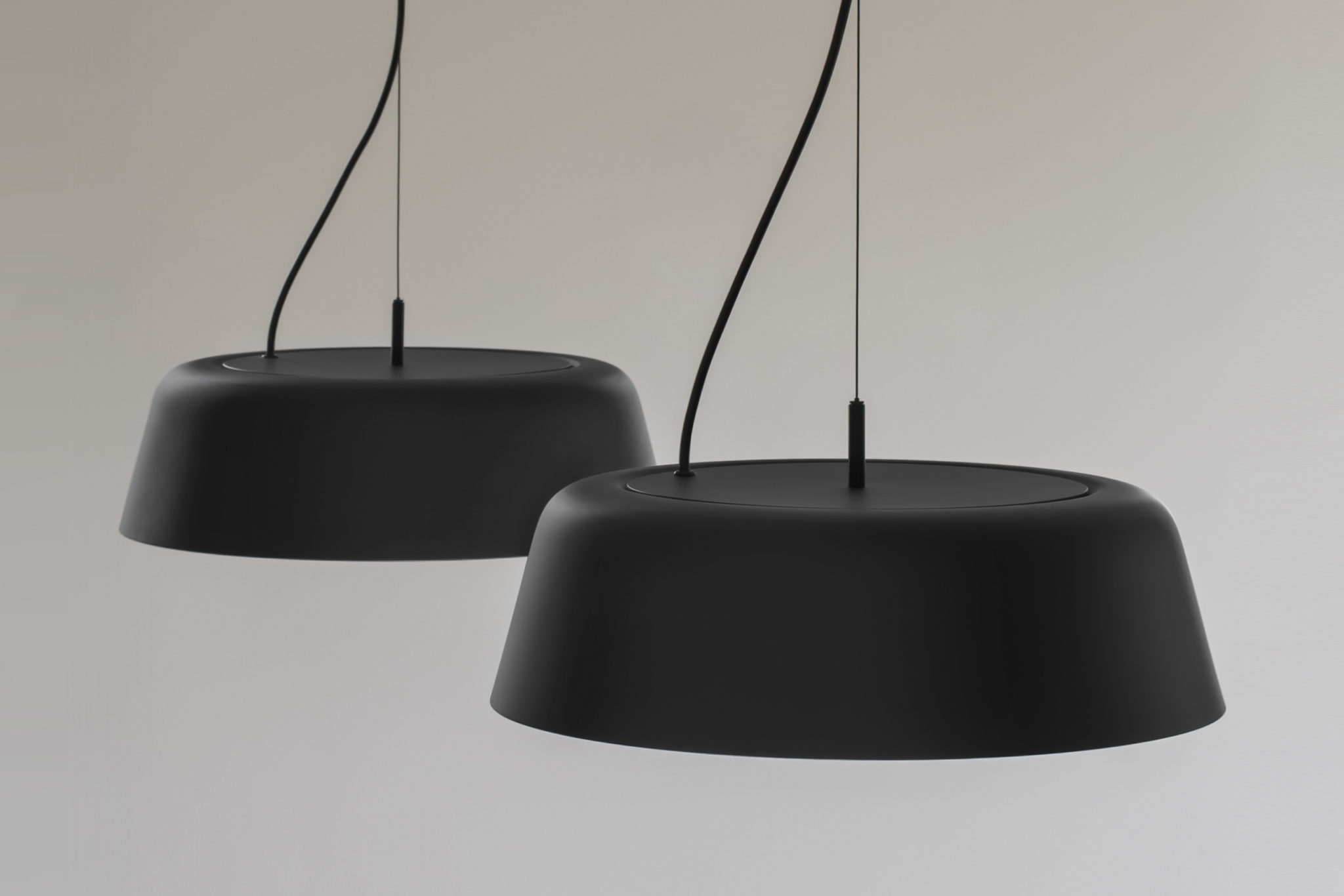 Bowl LED pendant luminaires in metal matt black powder-coated.