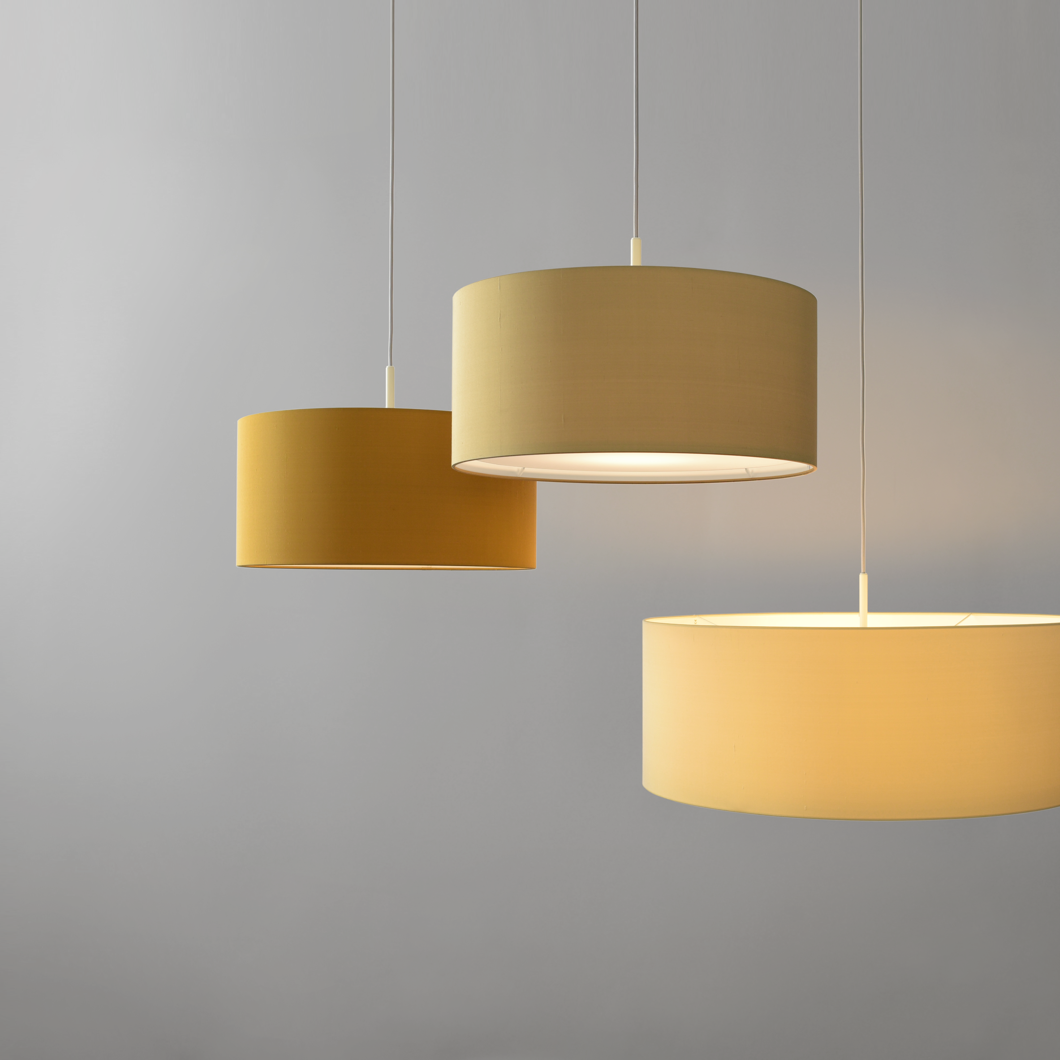 Set of CYLS DRUM pendant lights in dupion silks: champagne, ochre and almond