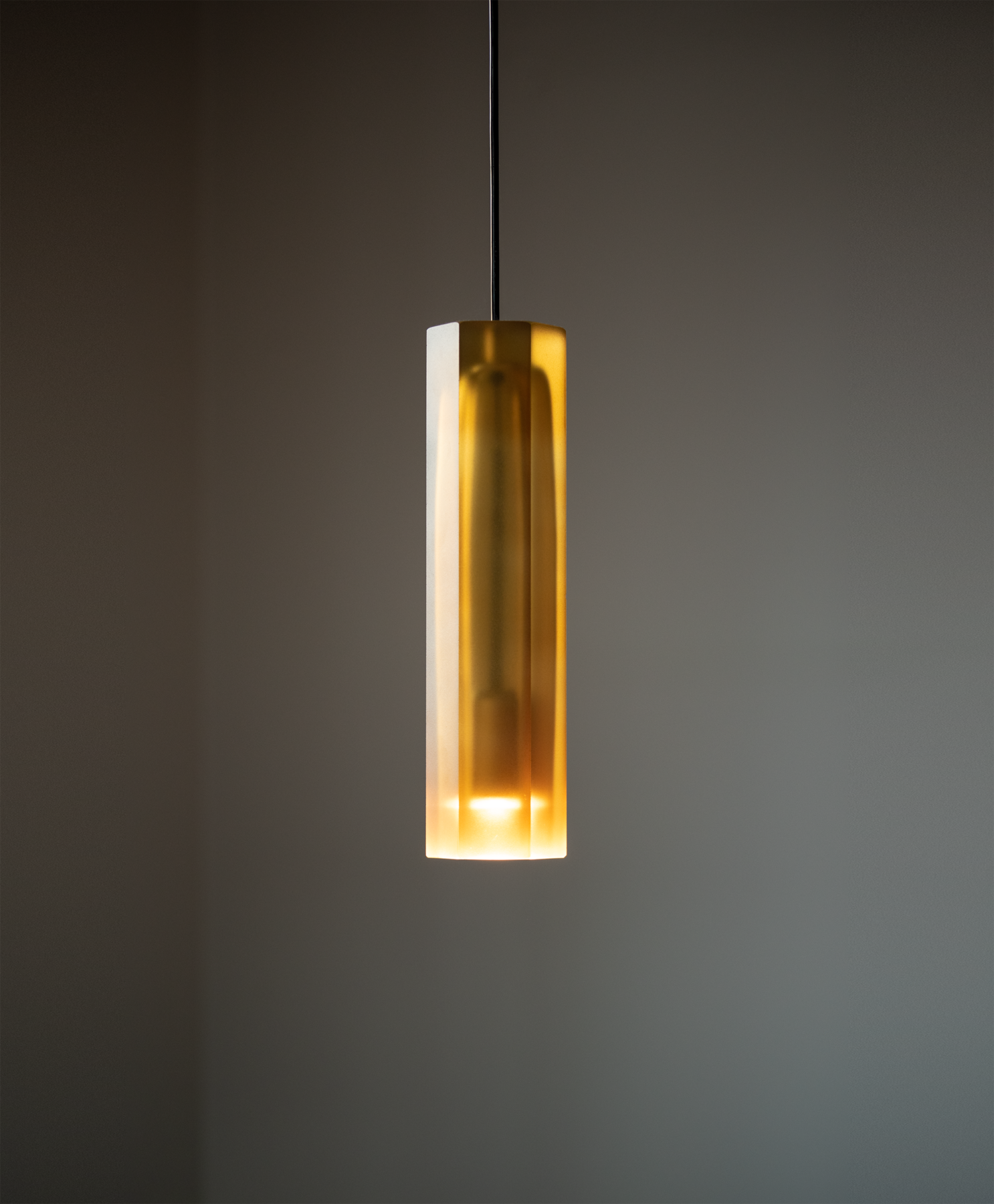 HON honey-colored hexagonal glass lamp with recessed LED.