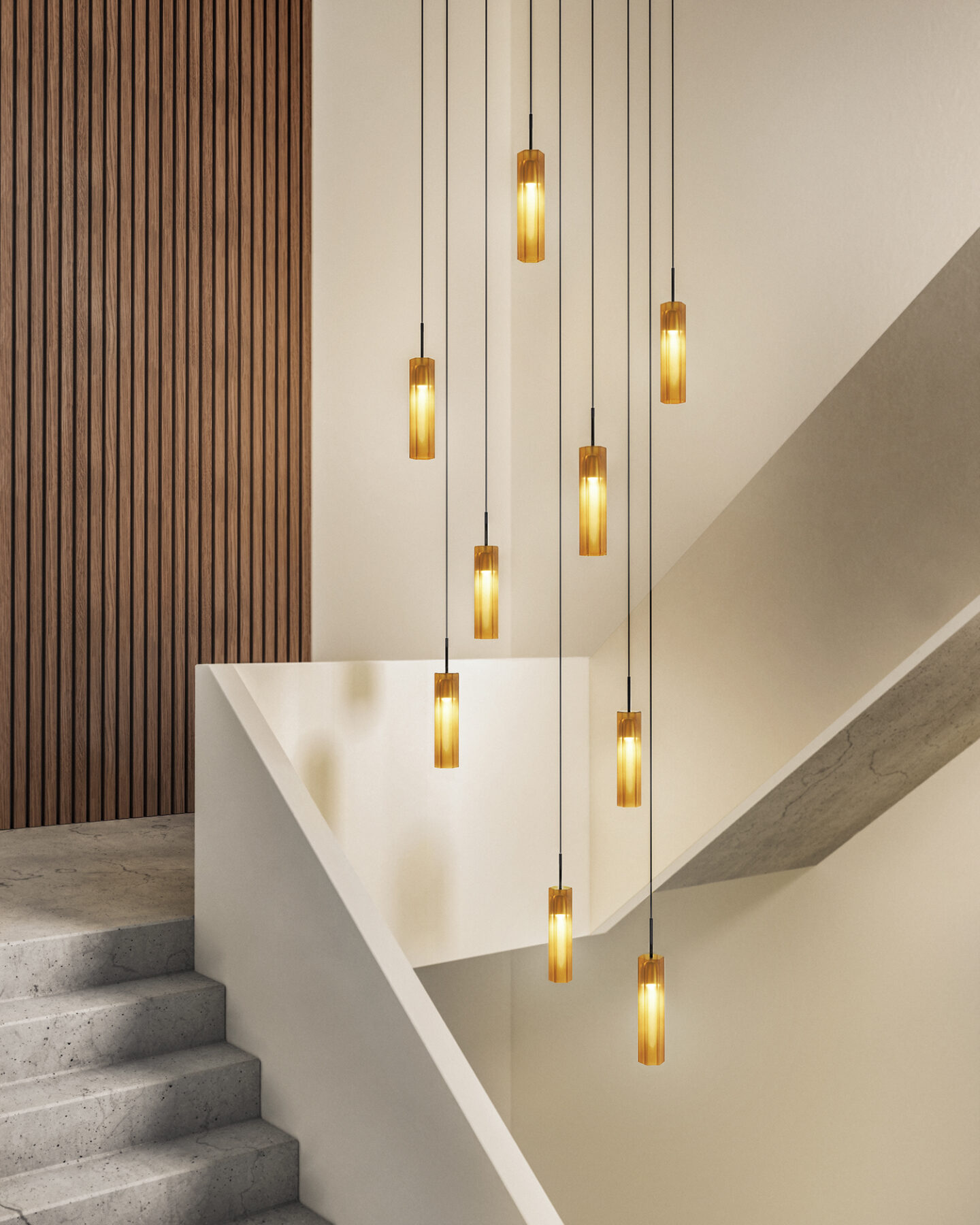 Ensemble of several honey-colored glass lights in a modern stairwell